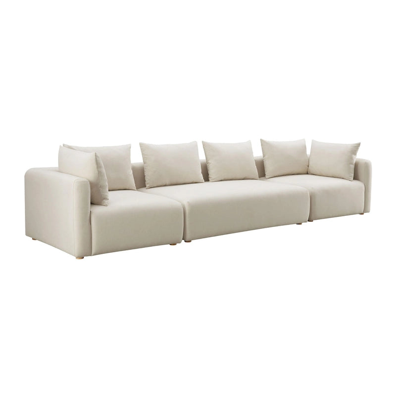 Canapé long tapissé couleur crème