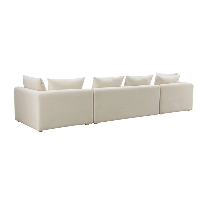 Canapé long tapissé couleur crème