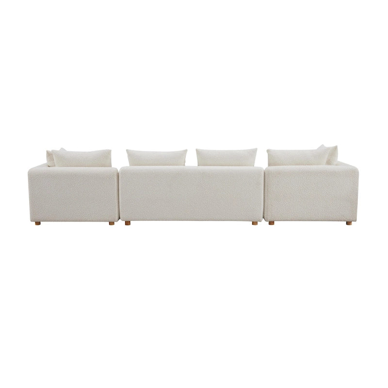 Canapé long tapissé couleur crème