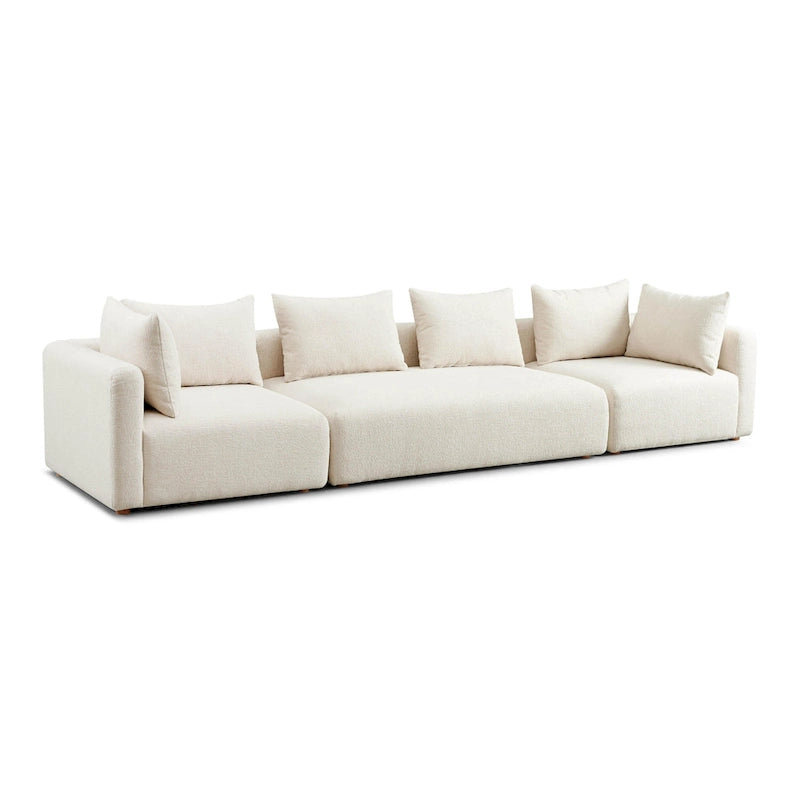 Canapé long tapissé couleur crème