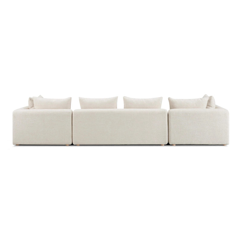 Canapé long tapissé couleur crème